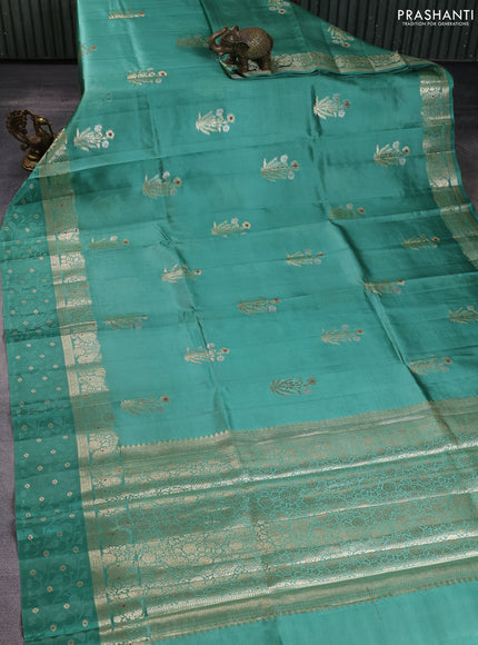 Poona silk saree teal green with floral zari woven buttas and zari woven self emboss border