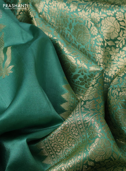 Poona silk saree teal green with floral zari woven buttas and zari woven self emboss border