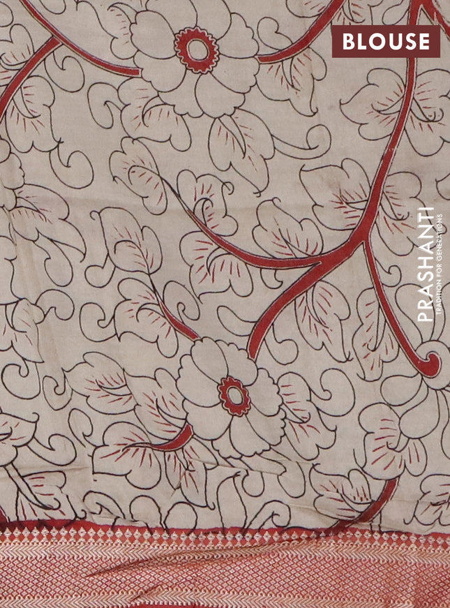 Kalamkari semi silk saree black and rust shade with allover prints and mangalgiri border
