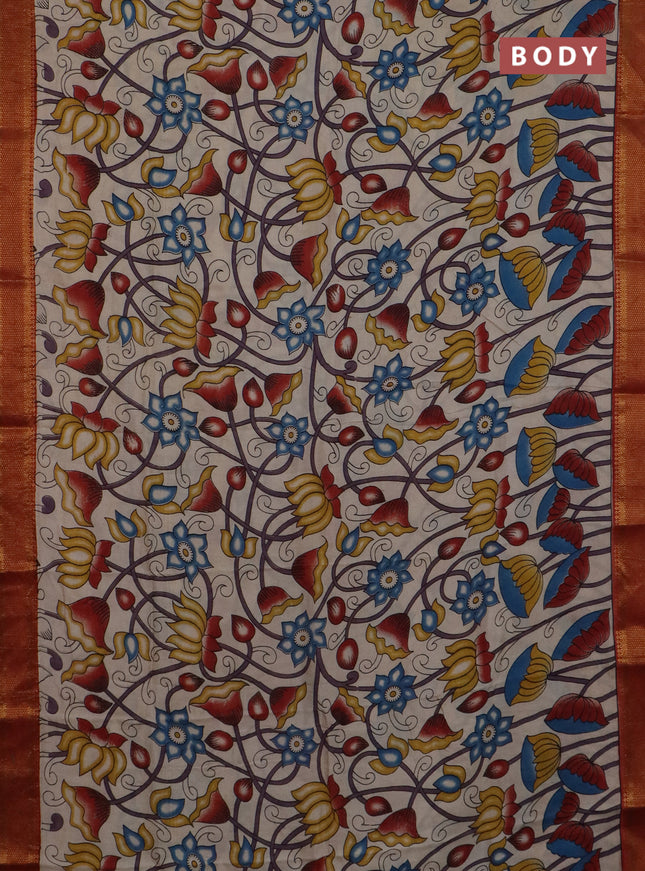 Kalamkari semi silk saree beige and rust shade with allover prints and mangalgiri border