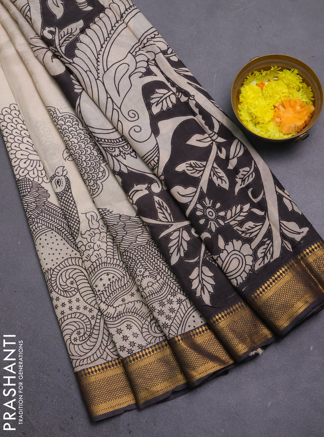 Kalamkari semi silk saree beige and brown with allover prints and mangalgiri border