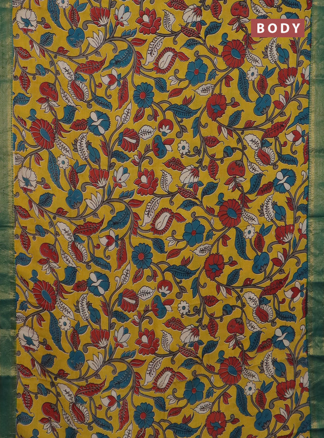 Kalamkari semi silk saree yellow and green with allover prints and mangalgiri border
