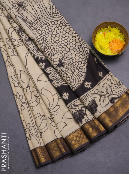 Kalamkari semi silk saree beige and brown with allover prints and mangalgiri border