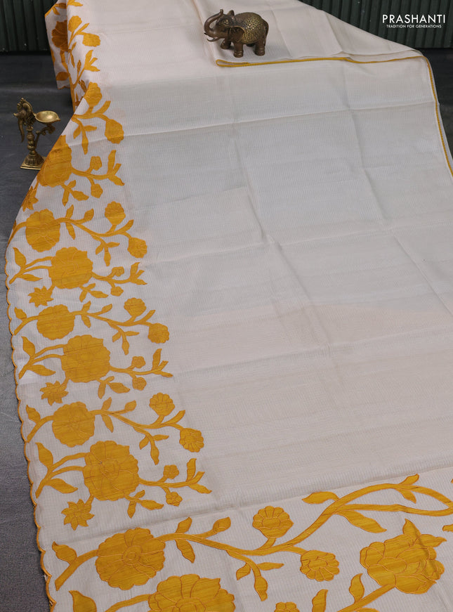Kota saree beige and mustard yellow with floral applique work