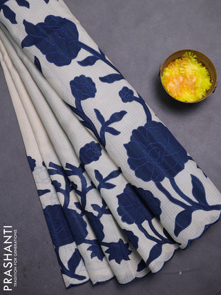 Kota saree beige and peacock blue with floral applique work