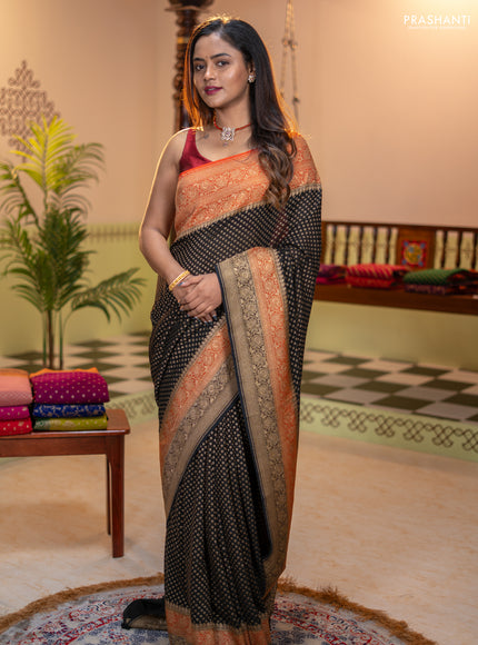 Banarasi georgette saree black and orange with allover thread & zari woven buttas and long woven border