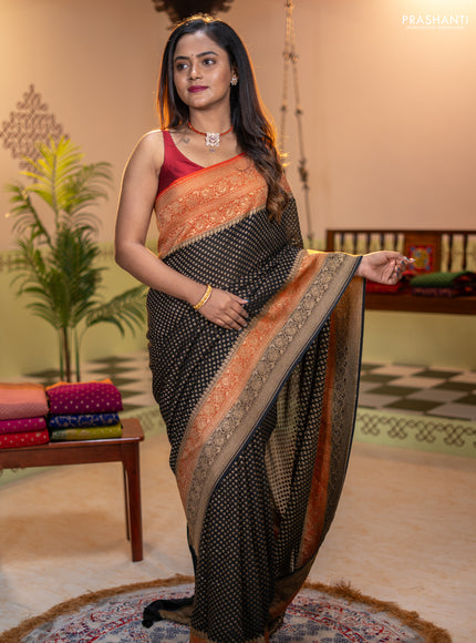 Banarasi georgette saree black and orange with allover thread & zari woven buttas and long woven border