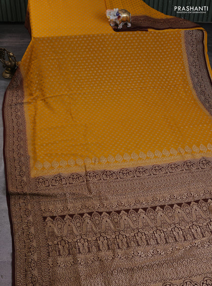 Banarasi georgette saree yellow and brown with allover thread & zari woven buttas and woven border