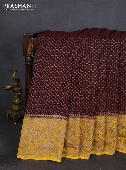 Banarasi georgette saree coffee brown and yellow with allover thread & zari woven buttas and woven border