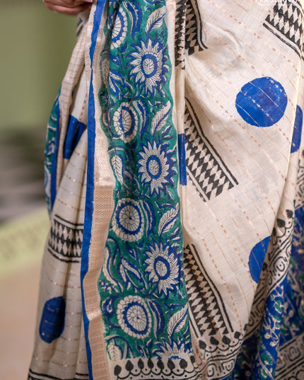 Semi chanderi saree cream and green with allover zari weaves & geometric block prints and long printed border