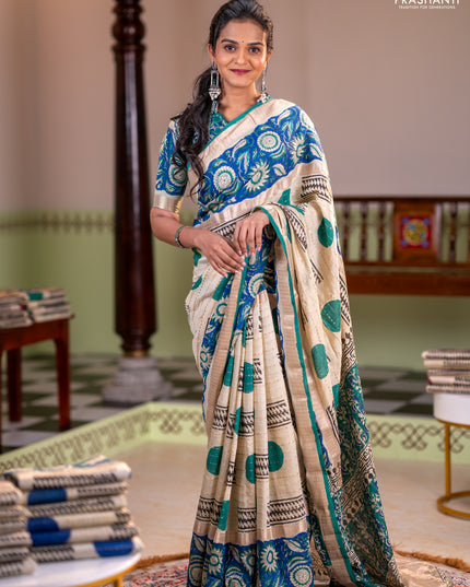 Semi chanderi saree cream and blue with allover zari weaves & geometric block prints and long printed border
