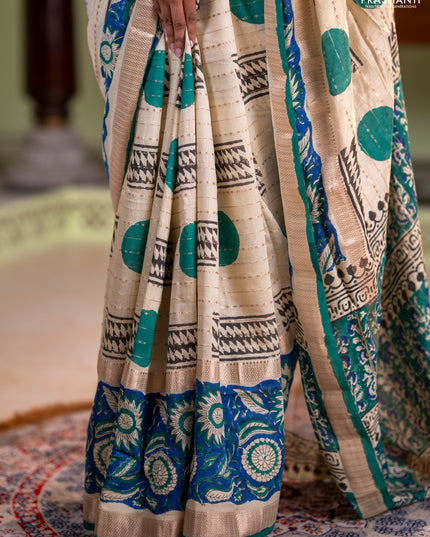Semi chanderi saree cream and blue with allover zari weaves & geometric block prints and long printed border