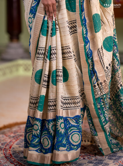 Semi chanderi saree cream and blue with allover zari weaves & geometric block prints and long printed border