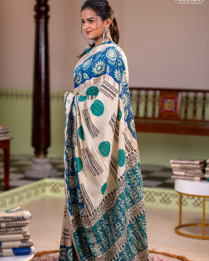 Semi chanderi saree cream and blue with allover zari weaves & geometric block prints and long printed border