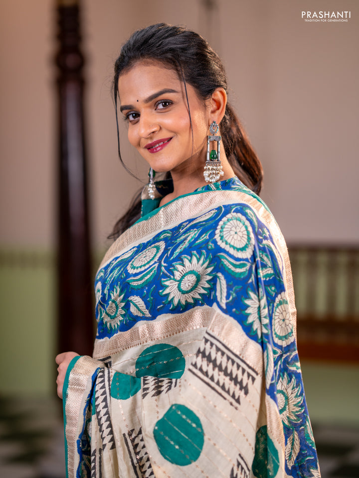 Semi chanderi saree cream and blue with allover zari weaves & geometric block prints and long printed border