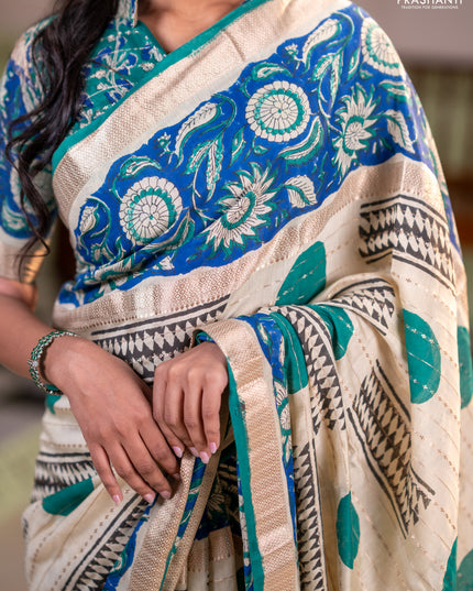 Semi chanderi saree cream and blue with allover zari weaves & geometric block prints and long printed border