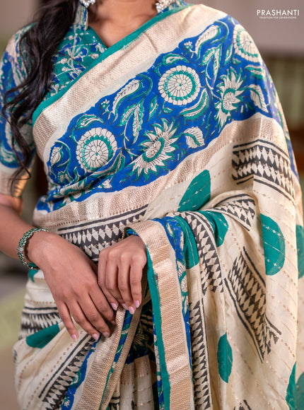 Semi chanderi saree cream and blue with allover zari weaves & geometric block prints and long printed border
