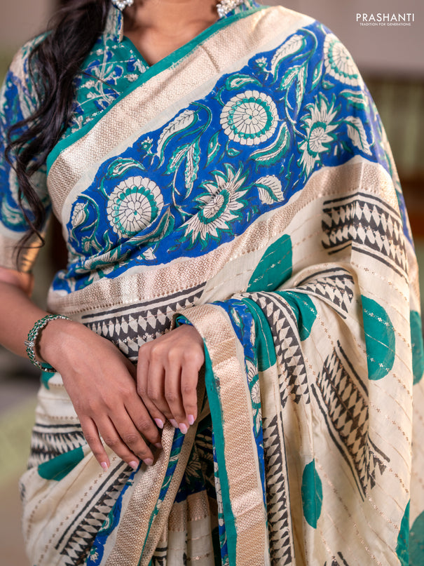 Semi chanderi saree cream and blue with allover zari weaves & geometric block prints and long printed border
