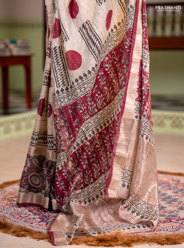 Semi chanderi saree cream and grey with allover zari weaves & geometric block prints and long printed border