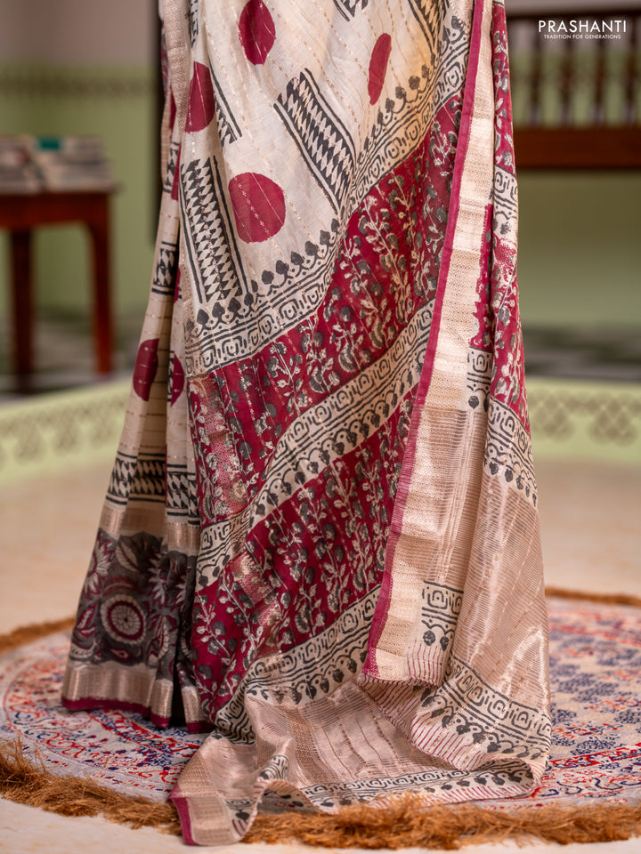 Semi chanderi saree cream and grey with allover zari weaves & geometric block prints and long printed border