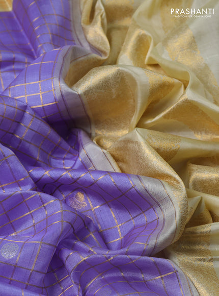 Kora kanchipuram silk saree lavender and cream with allover zari checks & buttas and zari woven korvai border