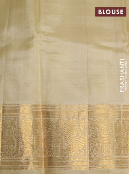Kora kanchipuram silk saree orange and cream with allover zari checks & buttas and zari woven korvai border
