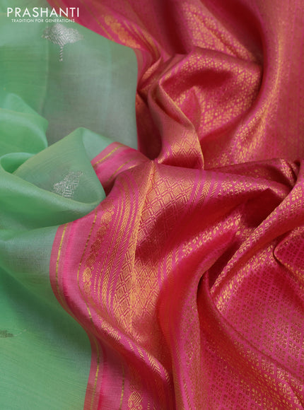 Kora kanchipuram silk saree pastel green and light pink with silver zari woven buttas and rich zari woven korvai border