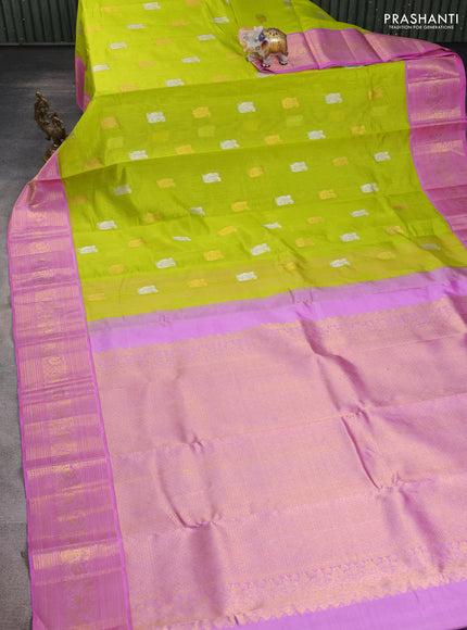 Kora kanchipuram silk saree fluorescent green and pastel pink with annam zari woven buttas and zari woven border