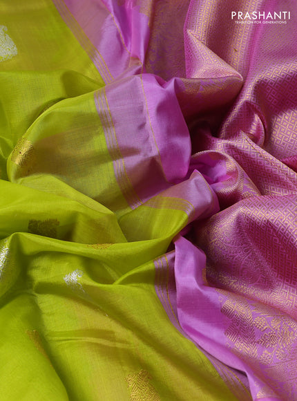 Kora kanchipuram silk saree fluorescent green and pastel pink with annam zari woven buttas and zari woven border