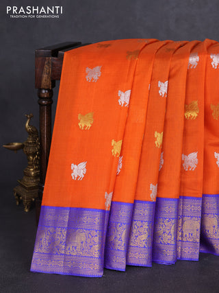 Kora kanchipuram silk saree orange and blue with allover silver & gold zari woven buttas and zari woven korvai border