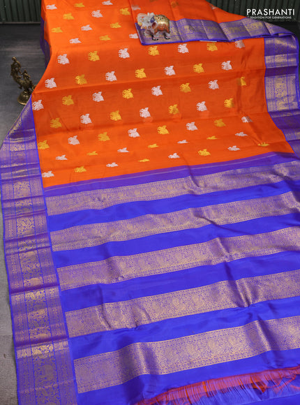 Kora kanchipuram silk saree orange and blue with allover silver & gold zari woven buttas and zari woven korvai border
