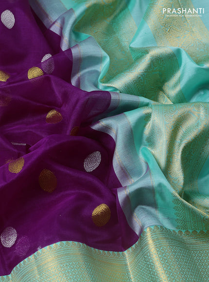 Kora kanchipuram silk saree purple and teal green with allover silver & gold zari woven buttas and long zari woven korvai border
