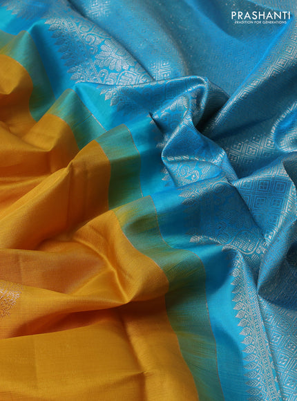 Kora kanchipuram silk saree mustard yellow and teal blue with zari woven buttas in bordeless style