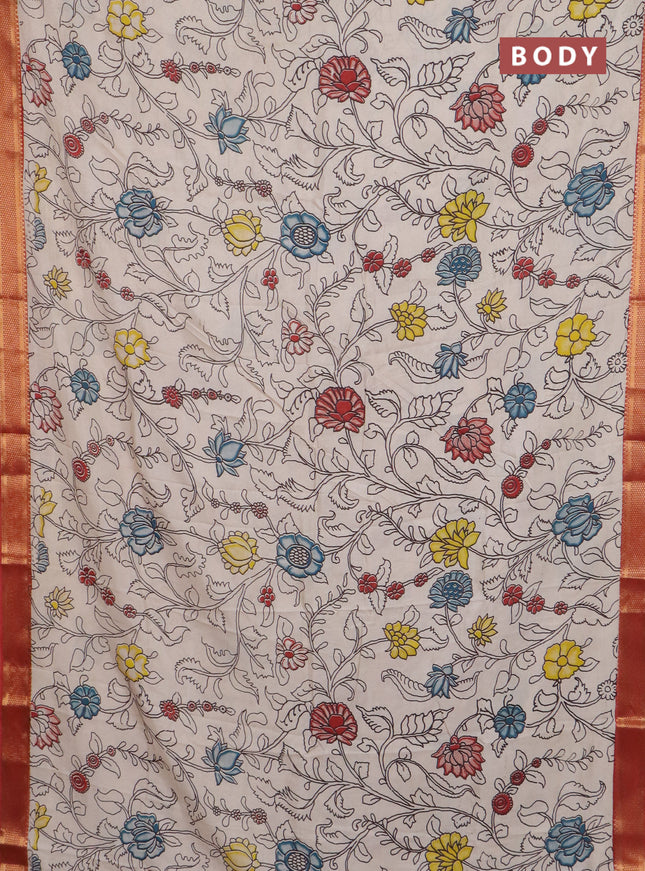 Kalamkari semi silk saree beige and rust shade with allover prints and mangalgiri border