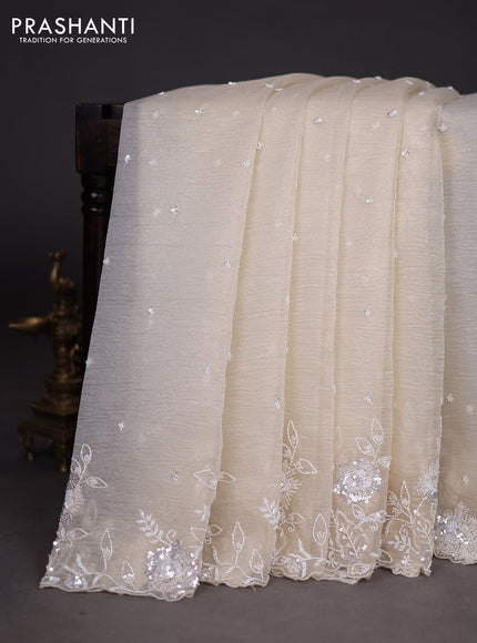 Crush tissue saree cream with beaded work and sequin & cut beaded work border
