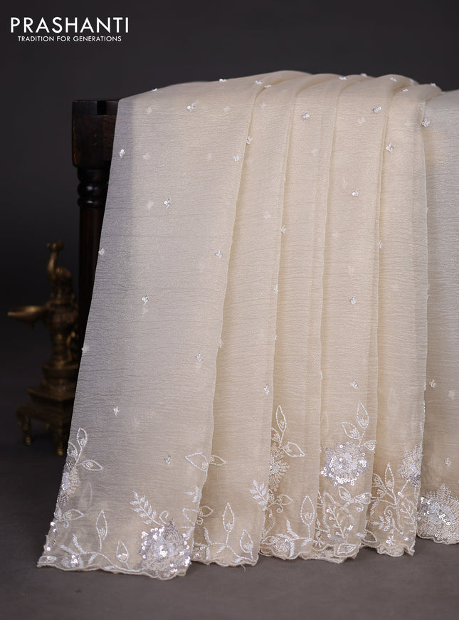Crush tissue saree cream with beaded work and sequin & cut beaded work border