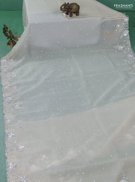 Crush tissue saree cream with beaded work and sequin & cut beaded work border