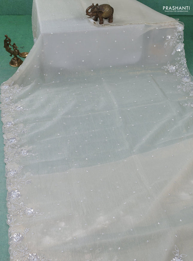 Crush tissue saree cream with beaded work and sequin & cut beaded work border