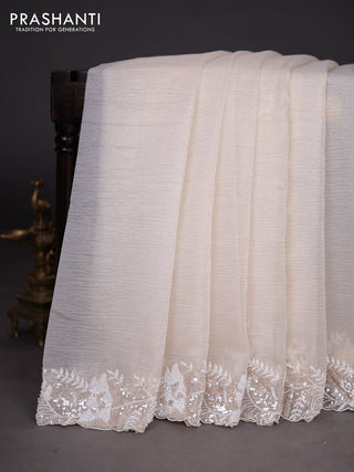 Crush tissue saree cream with sequin & cut beaded work
