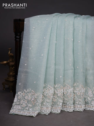 Crush tissue saree pastel green shade with sequin & cut beaded work