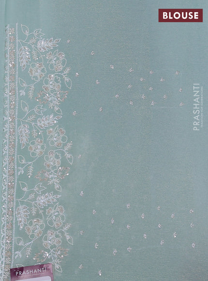 Crush tissue saree pastel green shade with sequin & cut beaded work