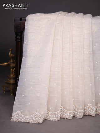Crush tissue saree cream with sequin & cut beaded work