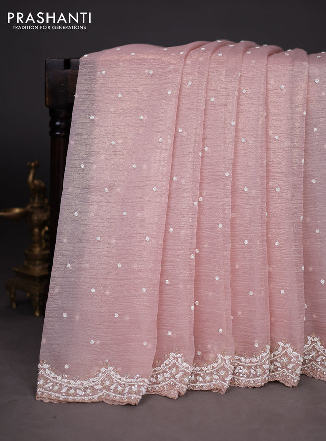 Crush tissue saree pastel peach with sequin & cut beaded work