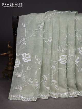Crush tissue saree pastel green with allover sequin & cut beaded work