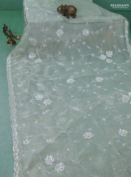 Crush tissue saree pastel green with allover sequin & cut beaded work