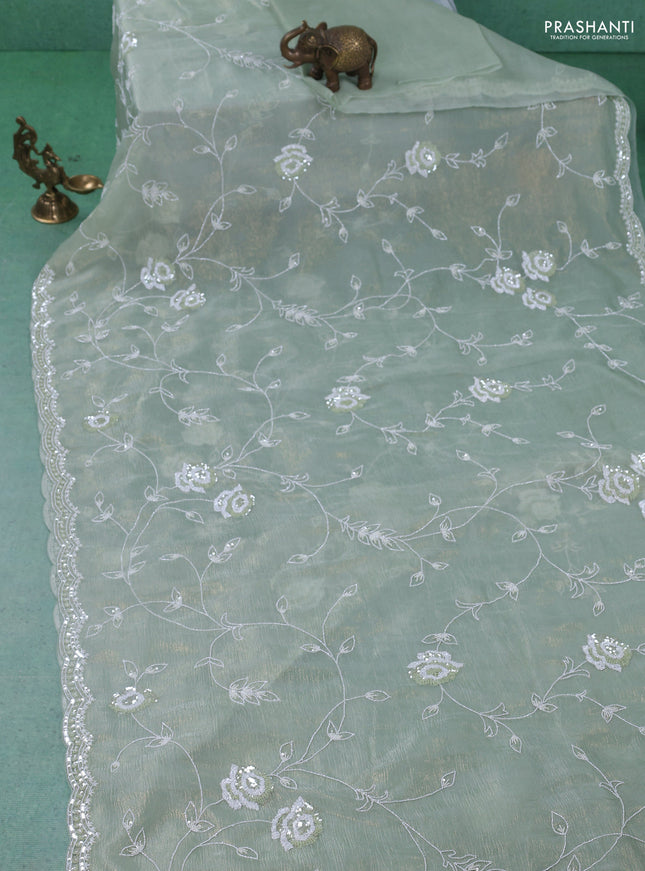 Crush tissue saree pastel green with allover sequin & cut beaded work