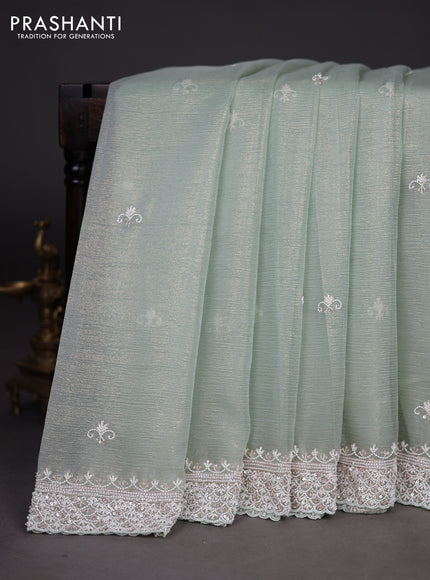 Crush tissue saree pastel green with beaded work and sequin & cut beaded work border