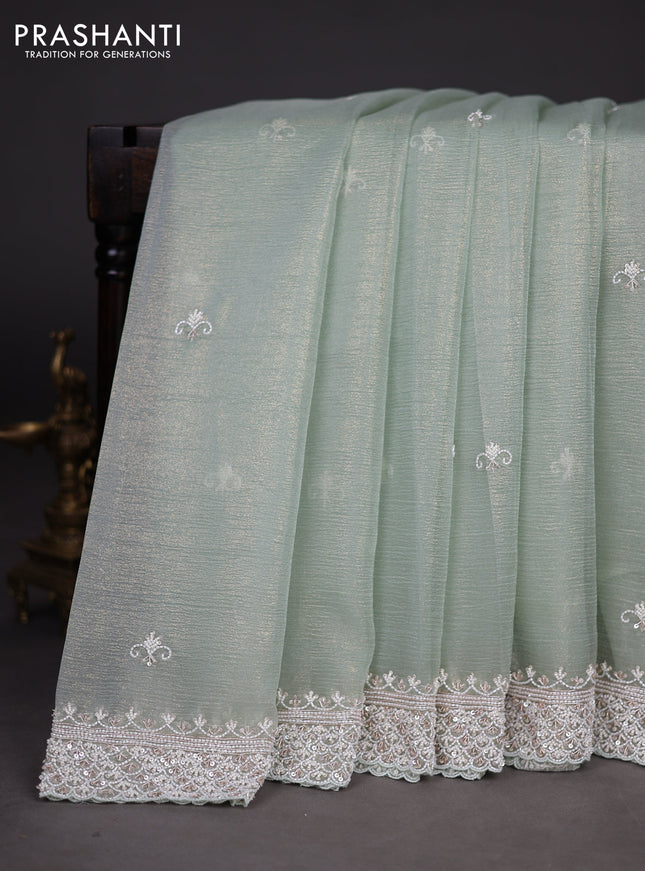 Crush tissue saree pastel green with beaded work and sequin & cut beaded work border