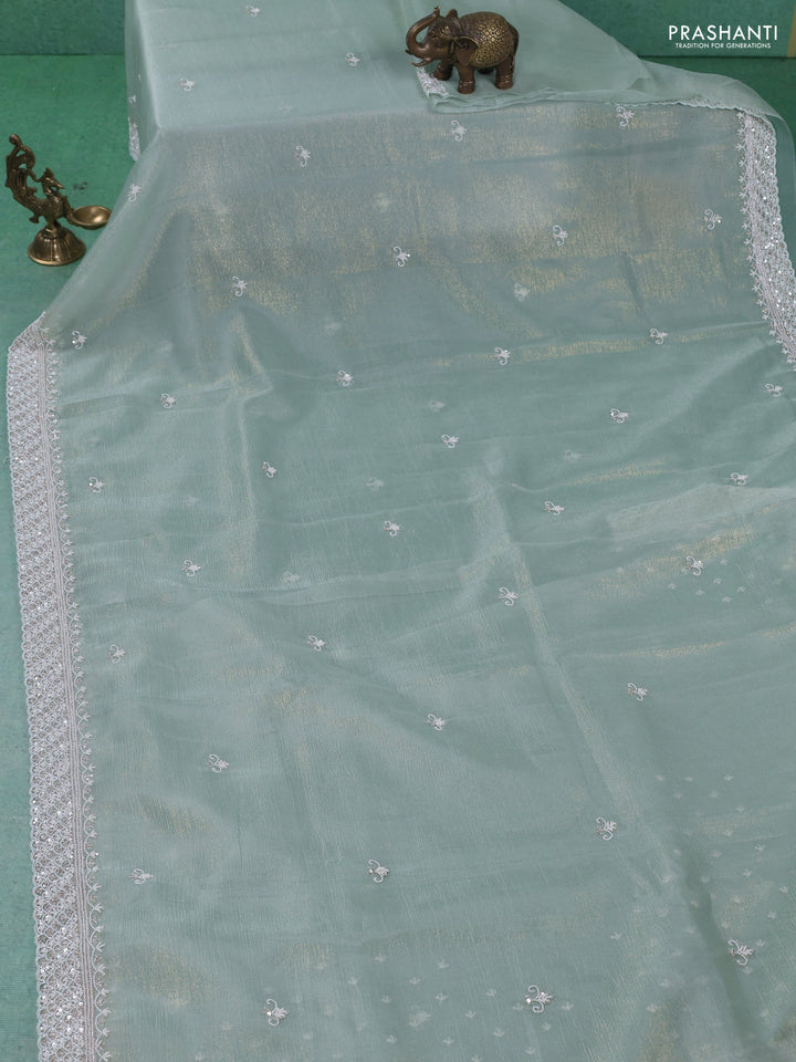 Crush tissue saree pastel green with beaded work and sequin & cut beaded work border