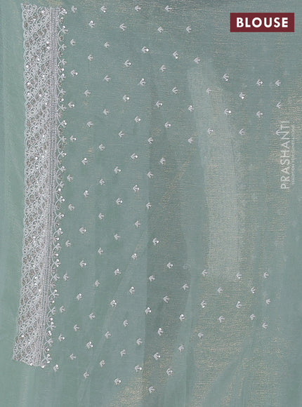 Crush tissue saree pastel green with beaded work and sequin & cut beaded work border
